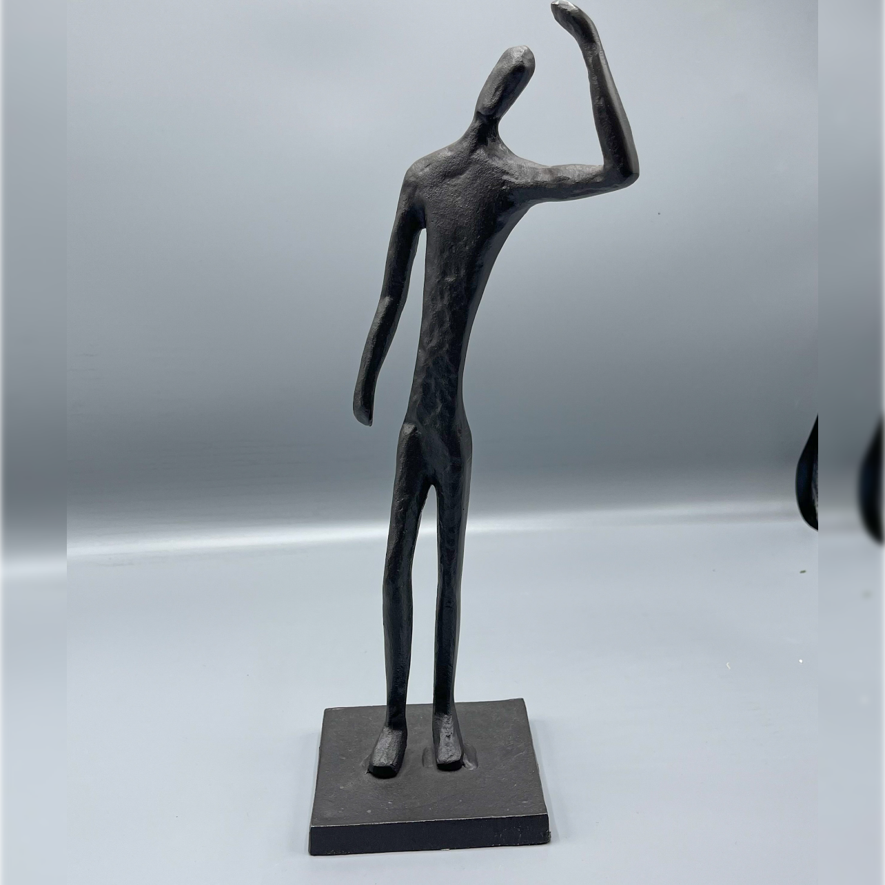 Waving Man Statue